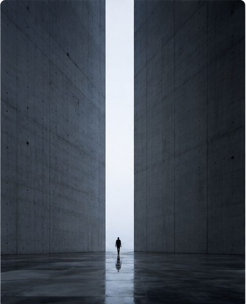 Concrete corridor opening to light