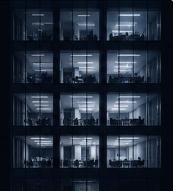 Lit office floors at night